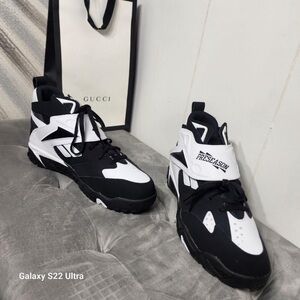 The Reebok Preseason 94 black and white shoes